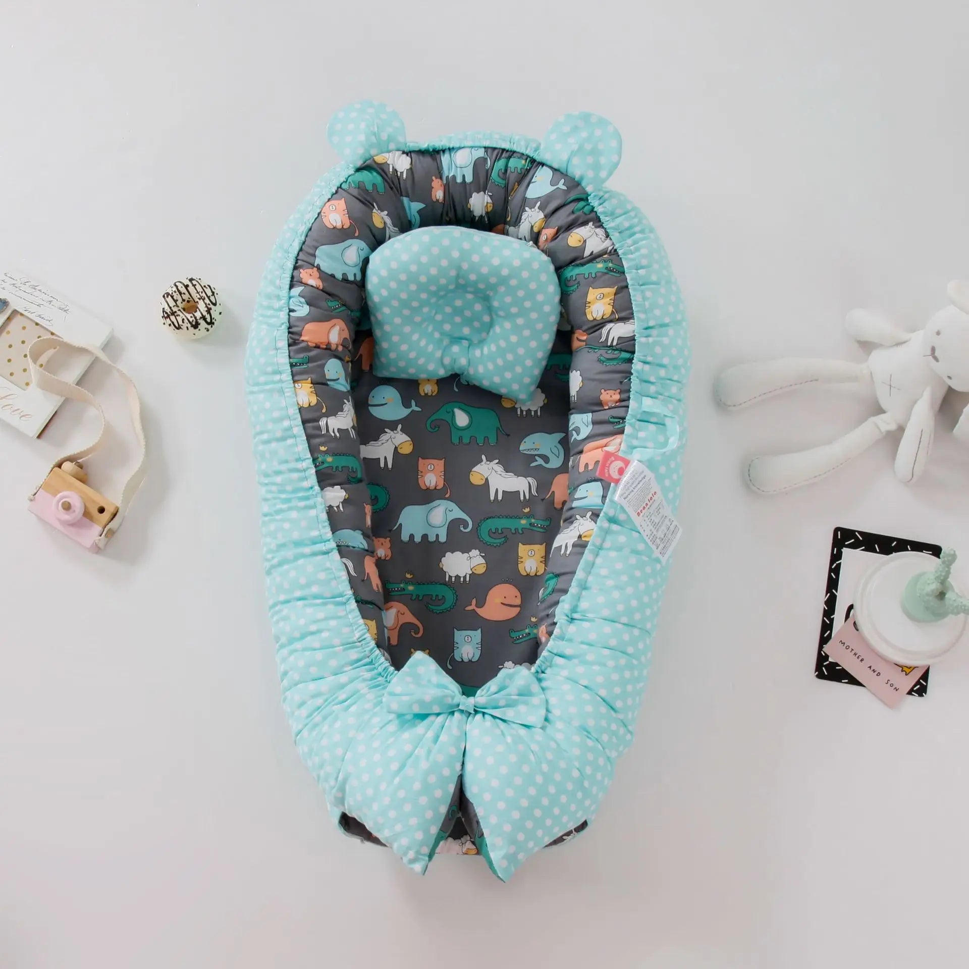 bebe reducteur de lit animaux multicolore