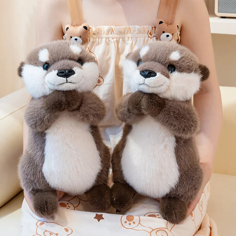 deux doudou loutre marron blanc