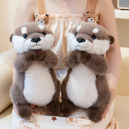 deux doudou loutre marron blanc