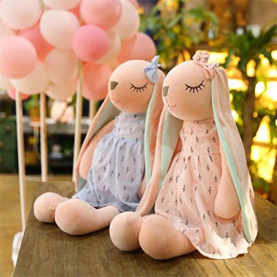 deux peluche lapin bleu rose