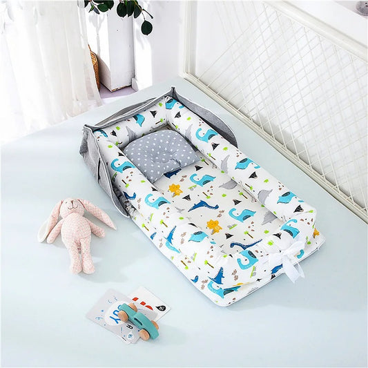 matelas à langer dinosaure portable gris