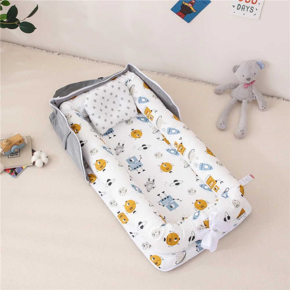 matelas à langer portable planète des machines
