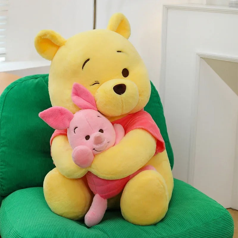 peluche Winnie ourson avec petit lapin