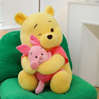 peluche Winnie ourson avec petit lapin