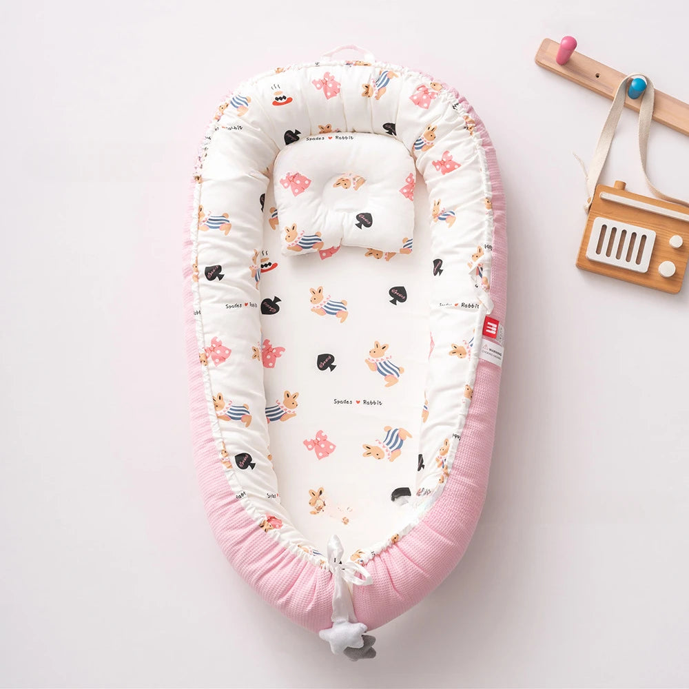 reducteur de lit rose lapine bleu