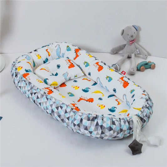  reducteur de lit 6 12 mois dinosaure
