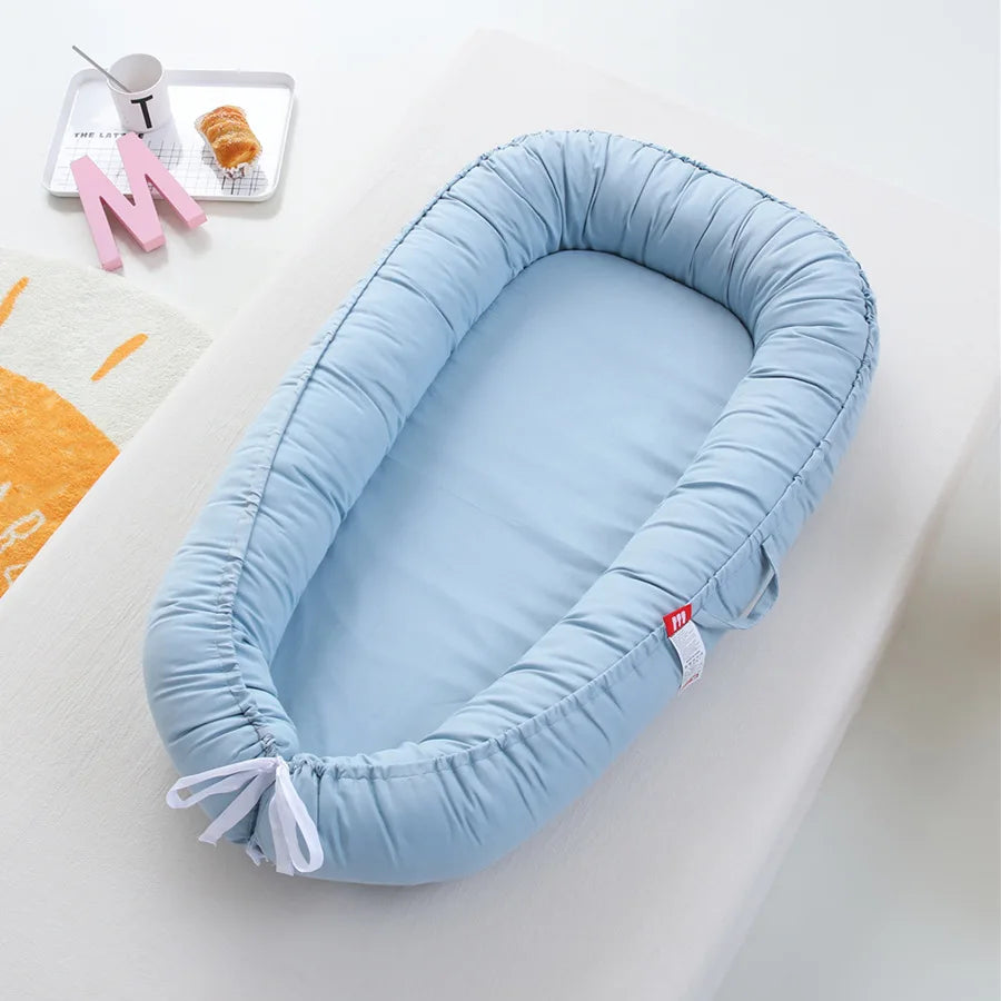 reducteur de lit bleu clair