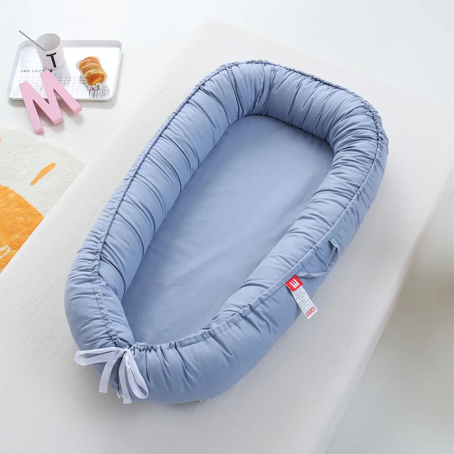 reducteur de lit bleu