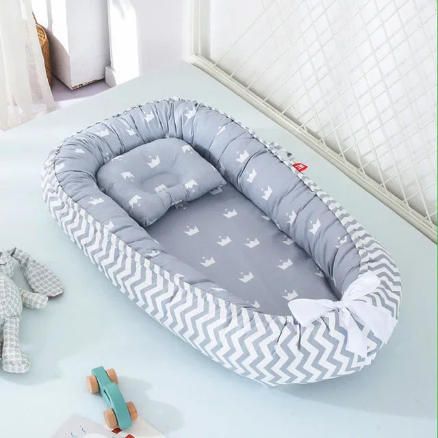 reducteur de lit gris couronne