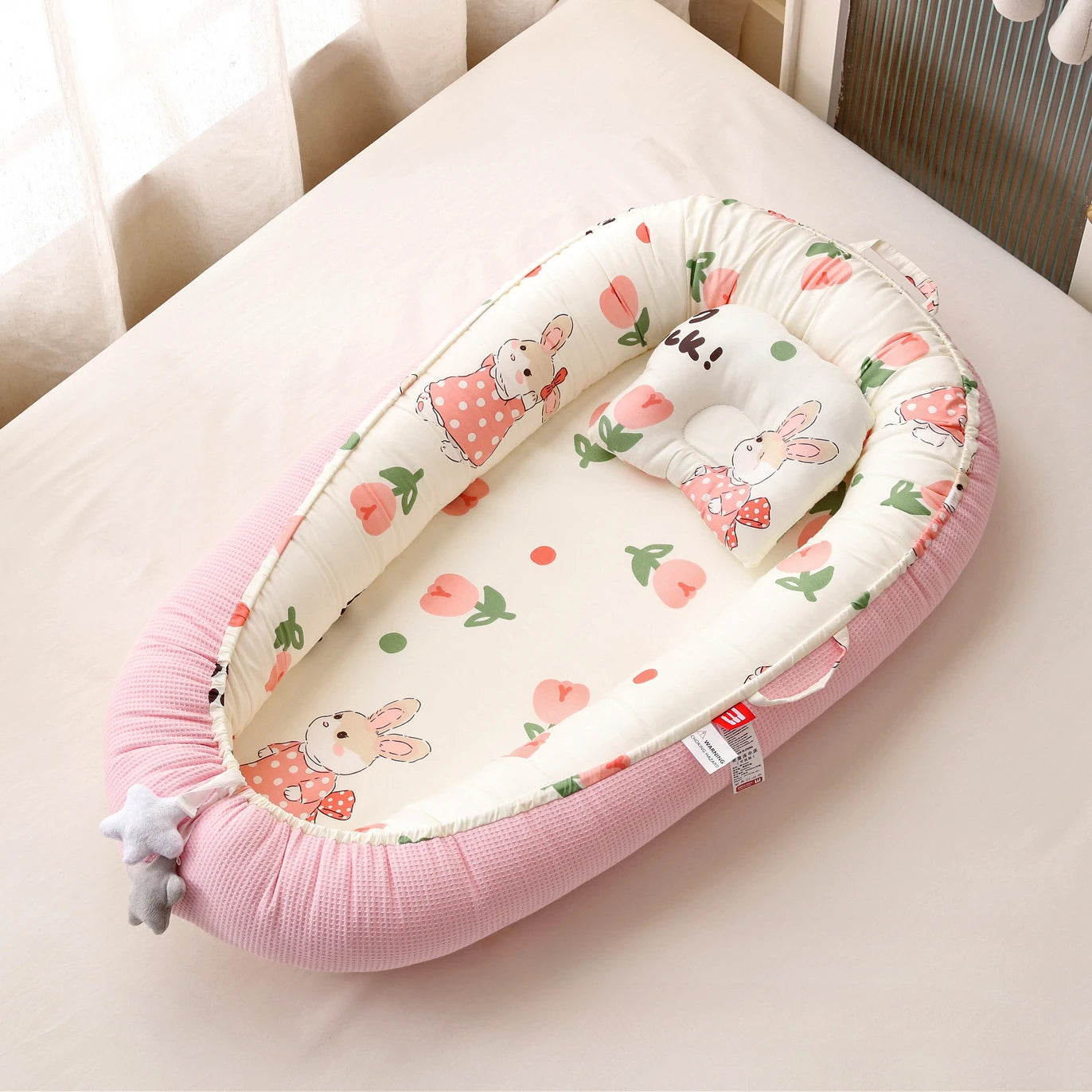 reducteur de lit rose lapine