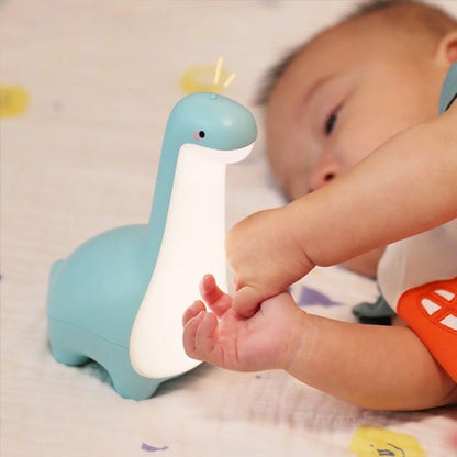 Veilleuse bébé dinosaure bébé allonge joue lampe